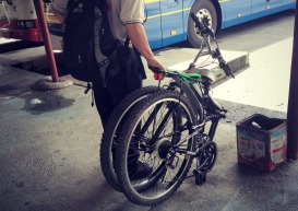 A foldable bike for the bus. Genius!