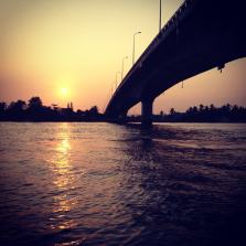 Sun rising over the bridge in Can Tho